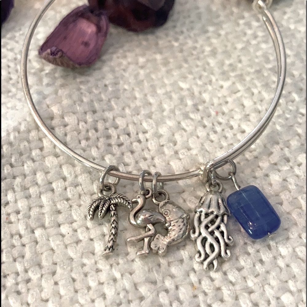 Expanding stainless bracelet Tibetan silver charms